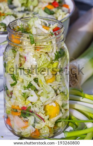 home made cultured or fermented vegetables in a glass jar