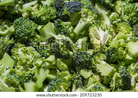 cooking broccoli, florets in a stainless steel pot