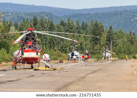 Prospect State Airport, Oregon  - September 9 : Helicopters on the runway ready to fight the 790 fire,September 9 2014 in Prospect State Airport, Prospect Oregon