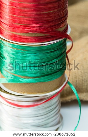close up of wrapping ribbons with christmas colors