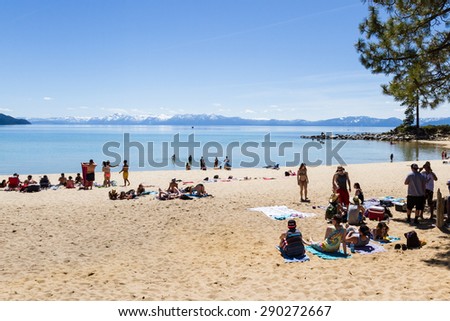 Lake Tahoe, Nevada - April 28 : Spring Break, College students enjoying a day at the beach, April 28 2015 Lake Tahoe, Nevada.