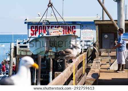 San Luis Obispo, California - Boat lift bringing up the boat with ease, May 03 2015 San Luis Obispo, California.