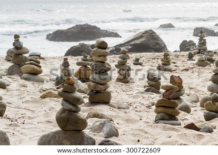 stacked rocks left behind by people as an art form in the California Coast