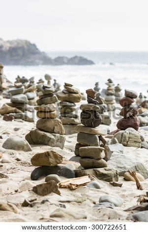 stacked rocks left behind by people as an art form in the California Coast