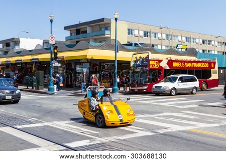 San Francisco, California - May 11 : Young girls in a rental go cart driving and exploring the city, May 11 2015 San Francisco, California.