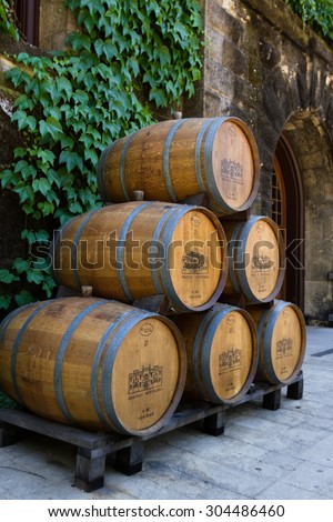 Calistoga, California - May 10 : Wine barrels stacked outside of the Chateau Montelena, May 10 2015 Calistoga, California.