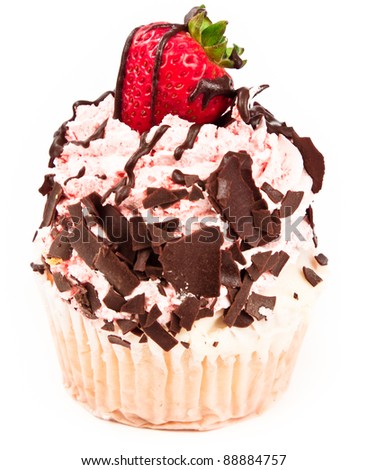 closeup of a strawberry cupcake isolated on white with chocolate on top