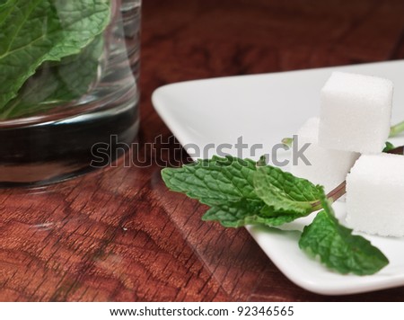 fresh mint on a bar top picked and ready to use in cocktails