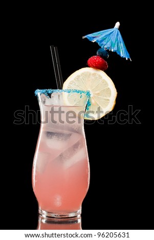 refreshing raspberry lemonade isolate don a black background, with an umbrella and a twist