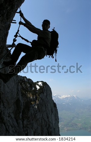 Extreme sport - silhouette of a climber