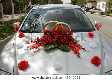 stock photo Wedding decoration on the hood of a car
