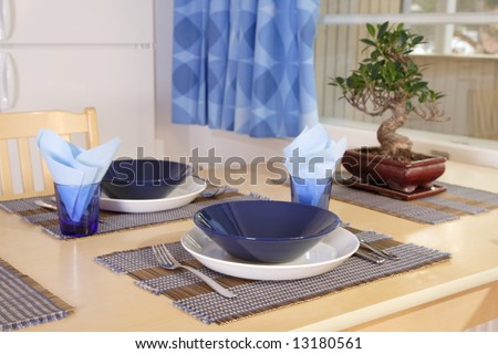 Kitchen interior detail with asian decorations and bonsai on the table