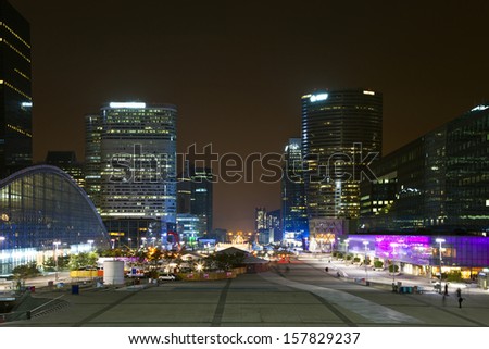 Perspective a night view of financial and business district of Paris - La Defense.