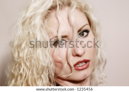 Portrait of the beautiful blond woman, a close up. Visit my portfolio, please! WELCOME!!!