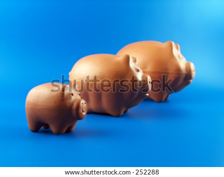 family of pig money boxes