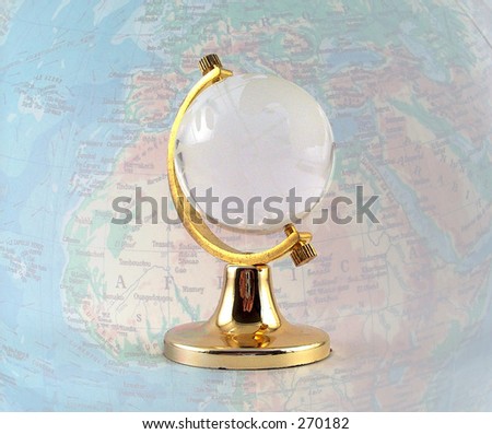 old glass globe, map in the background