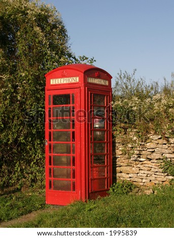Red Telephone box in country vertical format