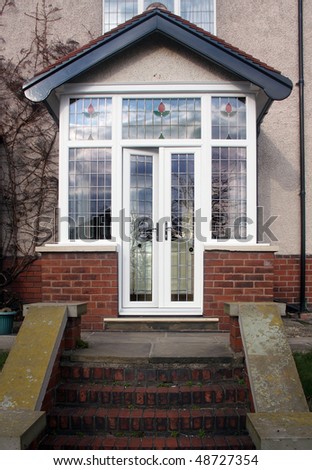 House entrance enlosed with a uPVC porch