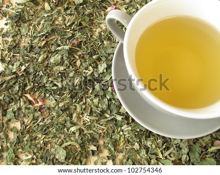Cup of tea on herbs