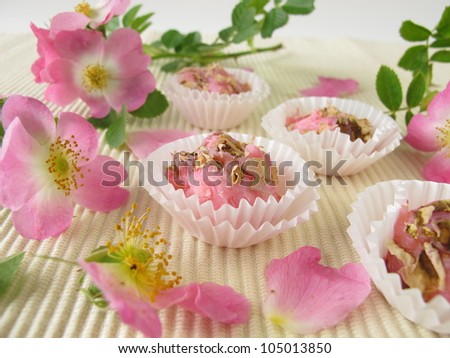 Handmade soap pralines with wild rose flowers