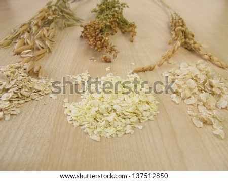 Rolled oats, rolled rice and rolled millet
