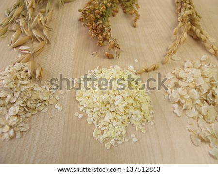 Rolled oats, rolled rice and rolled millet