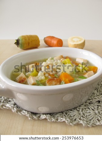 Vegetable soup with pearl barley and chicken