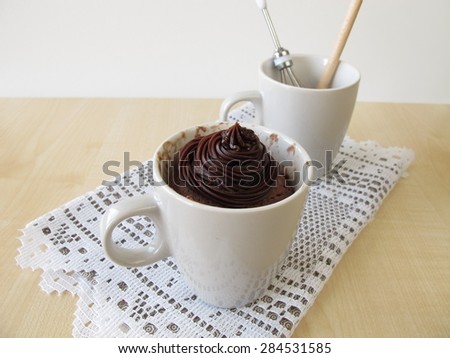 Nougat mug cake with chocolate topping