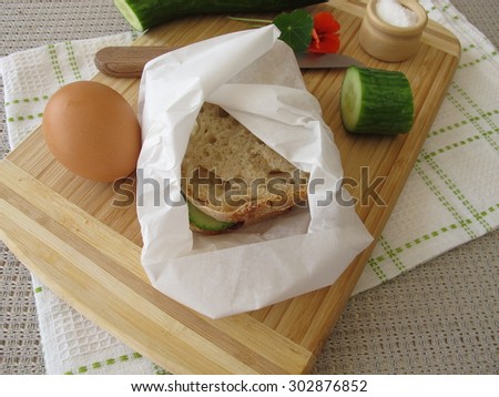 Cucumber sandwich in greaseproof paper