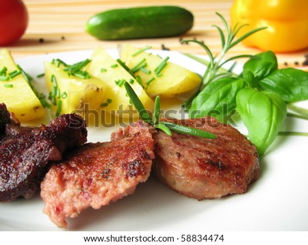 Jacket potatoes with red and liver sausage