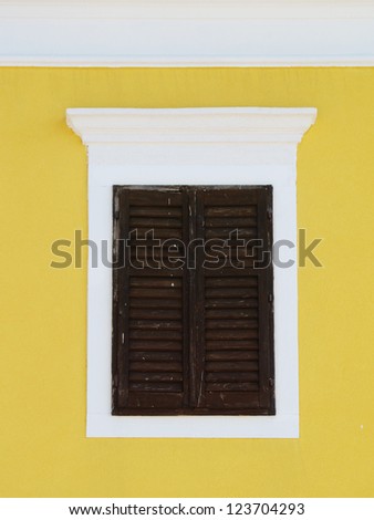 shutters 29 closed brown closed shutters in a yellow house