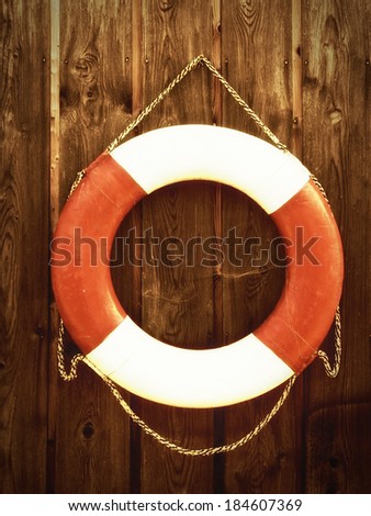 life belt on wooden wall