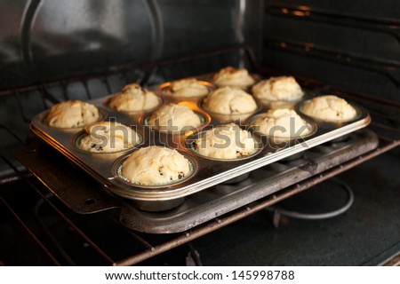 muffins on a baking tray in the oven