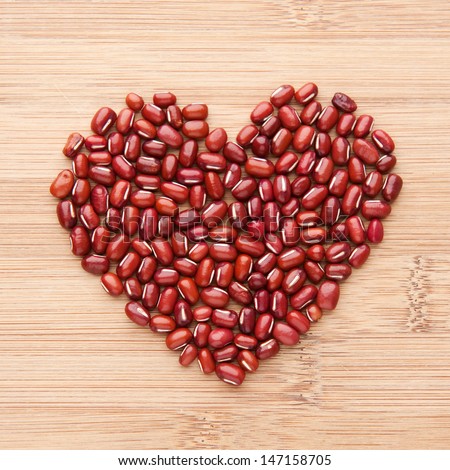 Heart shape by red beans. Common ingredient in Asian cuisine, red beans.
