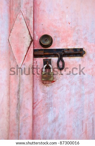 door key lock on red door