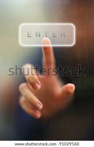 finger point as blur motion on enter key as background