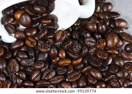 coffee seed in a cup of coffee background