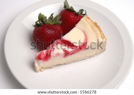 A slice of strawberry cheesecake and two strawberries.