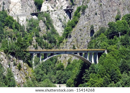 Crossing bridge in mountains