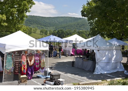 Delaplane, Virginia, USA-May 24, 2014: Vendor tents set up at the Delaplane Strawberry Festival at Sky Meadows State Park in Delaplane, Virginia.