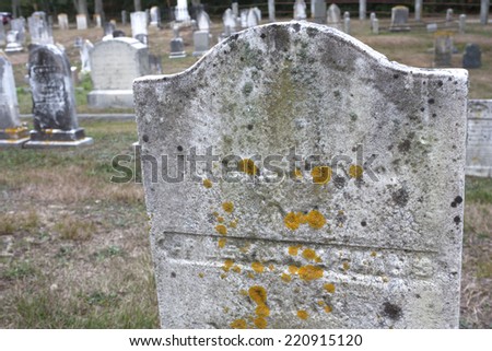 New England graveyard with green moss on stone in Truro,  Massachusetts, Cape Cod