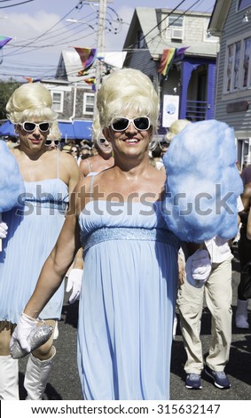 Provincetown, Massachusetts, USA-August 20, 2015: Drag queens walking in the 37th Annual Provincetown Carnival Parade in Provincetown, Massachusetts.