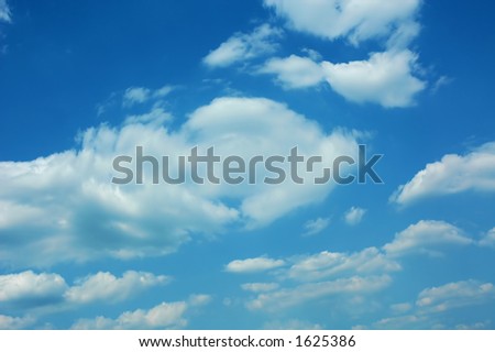 Beautiful blue sky with gradient background and many white clouds swirled