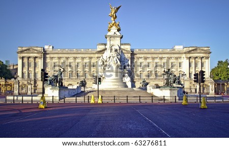 Buckingham Palace and Victoria Memorial in London, home to the Queen of England. Clear deep blue summer sky.
