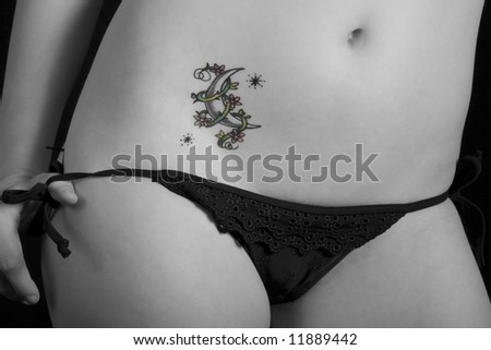 stock photo : tattoo of moon on tummy