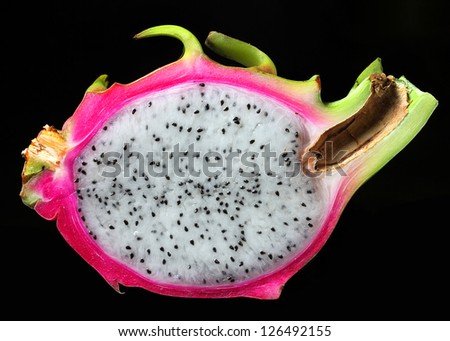 Half Dragon Fruit on black background