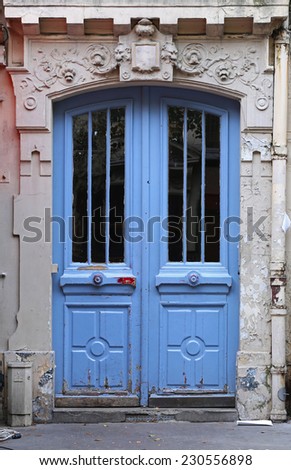 Classic painted wooden door in Paris