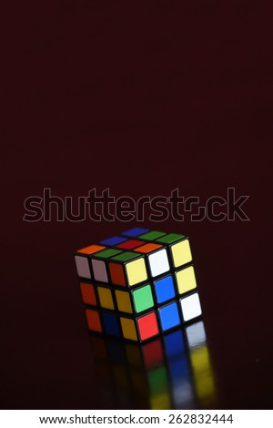 RIJEKA, CROATIA - MARCH 22, 2015: Rubik\'s cube on the dark background. Rubik\'s Cube on a dark background with a reflection.