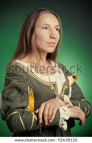 The medieval peasant woman in a green dress