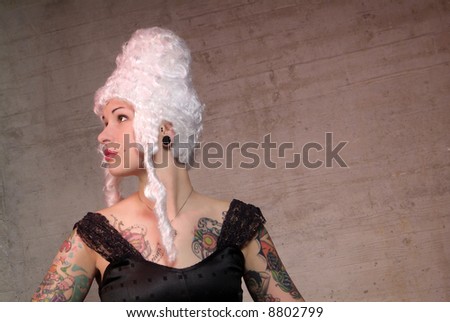 woman with white peruke and tattoo